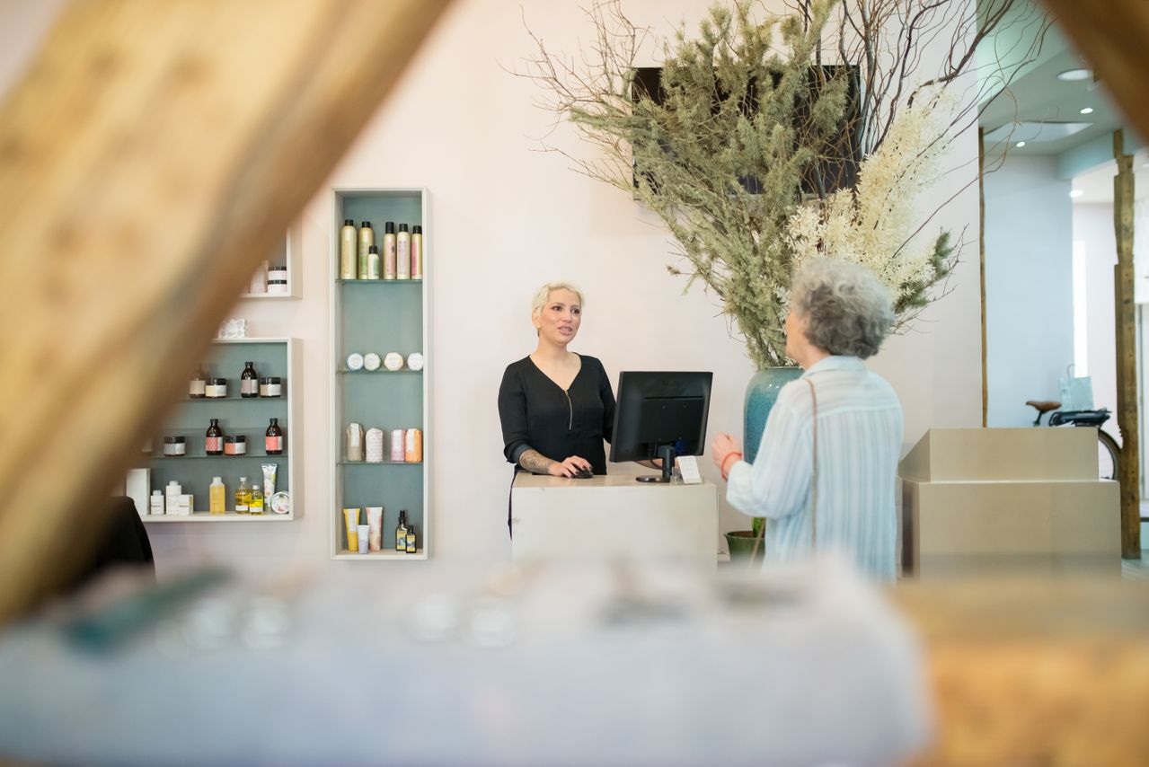 Small business owner behind the counter